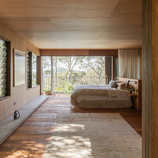 Interior photograph of Bayview Tree House by The bedrooms on the first floor are quiet, with the feeling of being in a Japanese style tree house. Photographer: Luke Shadbolt